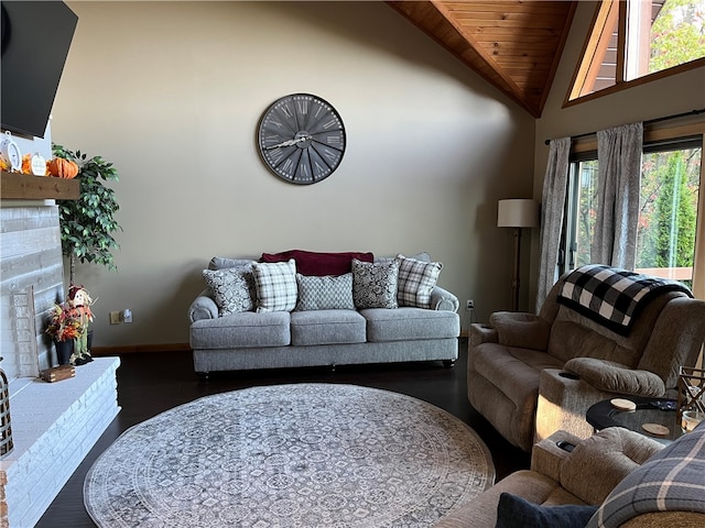 living room featuring wood ceiling, dark hardwood / wood-style floors, high vaulted ceiling, and a fireplace