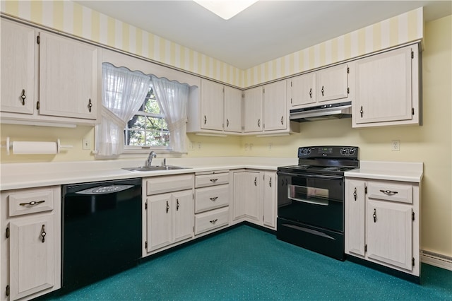 kitchen featuring black appliances, a baseboard heating unit, and sink