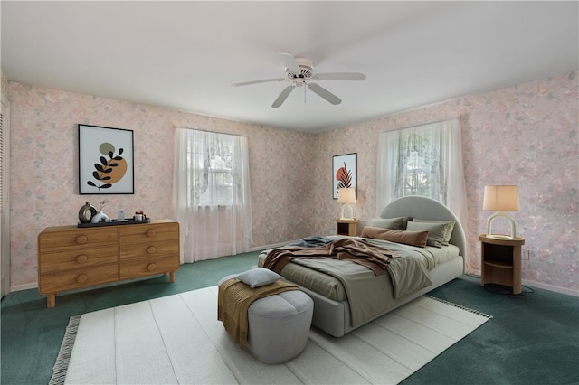 bedroom with ceiling fan and dark colored carpet