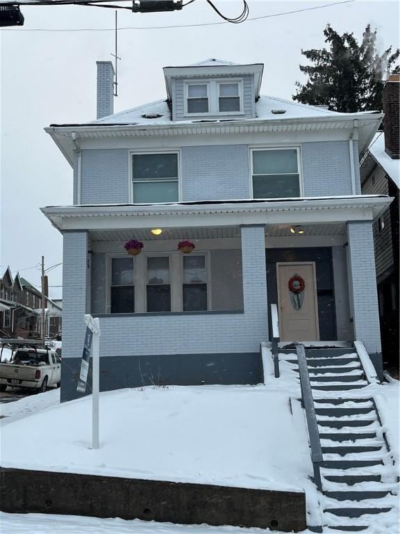 view of front property featuring a porch