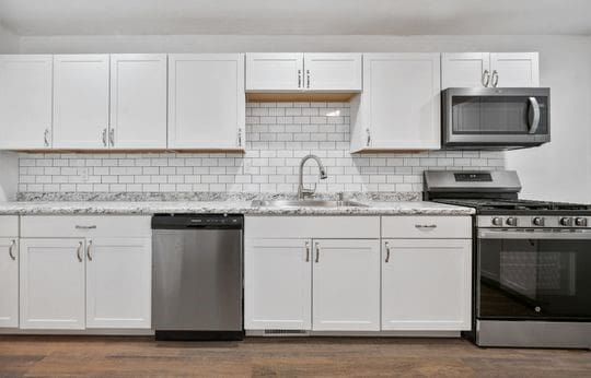 kitchen featuring white cabinets and stainless steel appliances