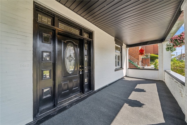 property entrance with a porch