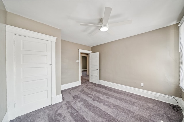 unfurnished bedroom with carpet flooring and ceiling fan