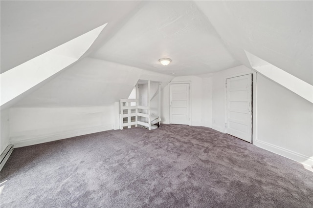 bonus room with lofted ceiling and carpet flooring