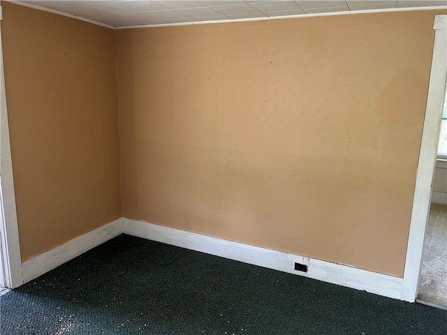 unfurnished room featuring carpet flooring