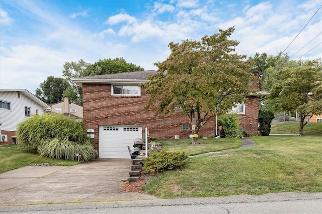 view of front of property featuring a garage and a front yard