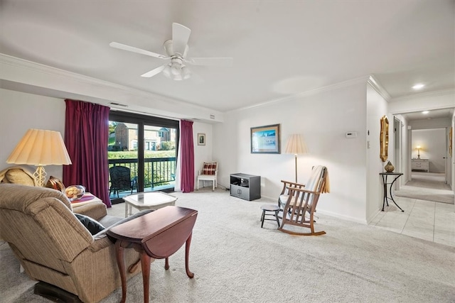 carpeted living room with ceiling fan and crown molding