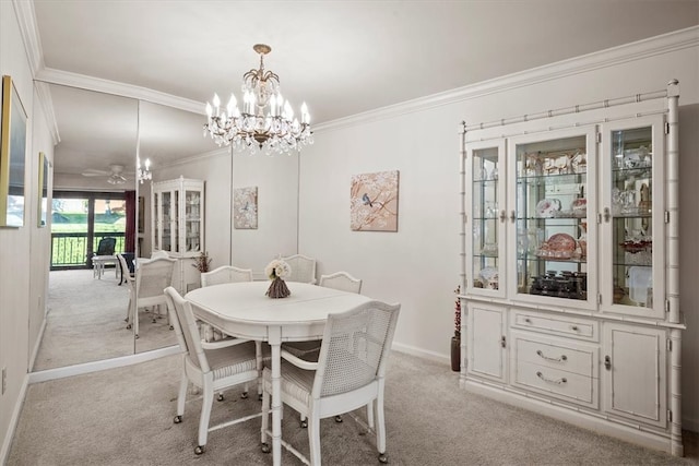 carpeted dining room featuring crown molding and a notable chandelier