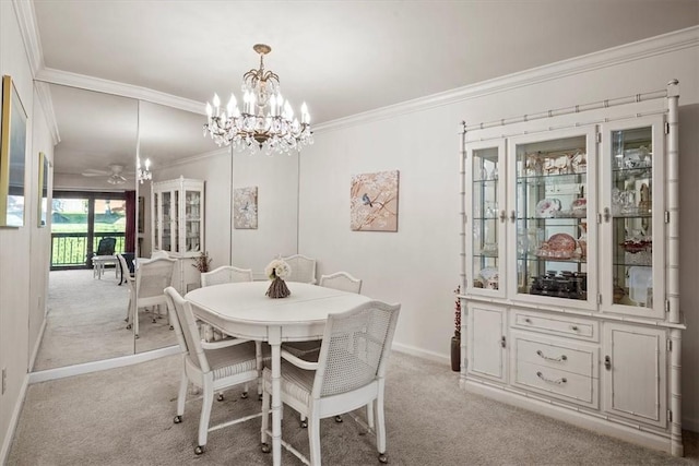 1500 Cochran Rd Unit 712, Scott Twp Sal, PA 15243 - dining space featuring ceiling fan with notable chandelier, baseboards, ornamental molding, and light carpet