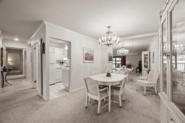 dining area featuring crown molding, light colored carpet, and an inviting chandelier