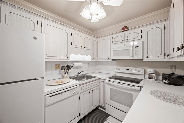 kitchen featuring crown molding, white appliances, white cabinetry, sink, and ceiling fan