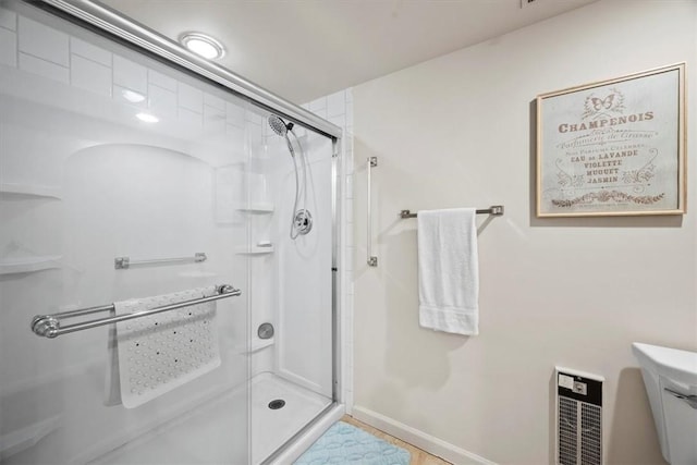 1500 Cochran Rd Unit 712, Scott Twp Sal, PA 15243 - full bathroom with toilet, a stall shower, and baseboards