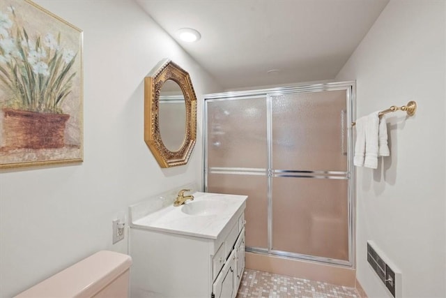 1500 Cochran Rd Unit 712, Scott Twp Sal, PA 15243 - bathroom with toilet, visible vents, a shower stall, and vanity