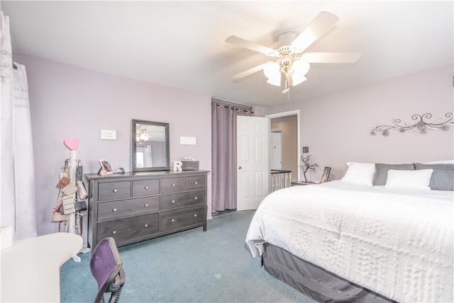 bedroom featuring light carpet and ceiling fan