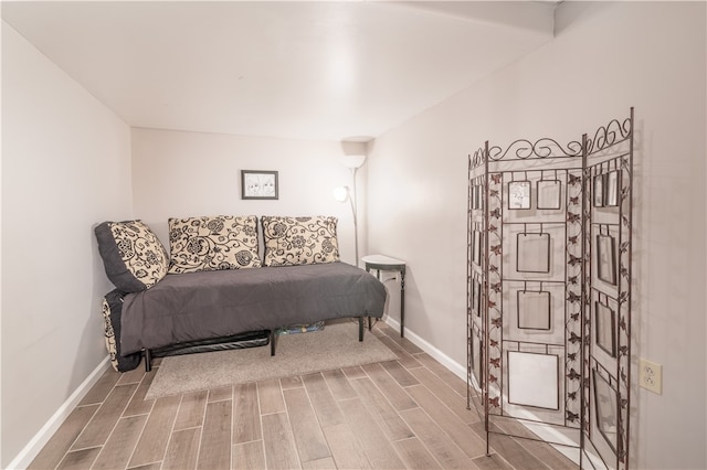 bedroom featuring hardwood / wood-style floors