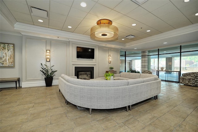 living room with ornamental molding