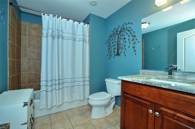 full bathroom with vanity, toilet, shower / tub combo with curtain, and tile patterned flooring