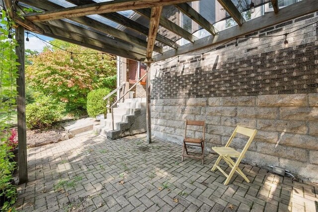 view of patio / terrace featuring a pergola