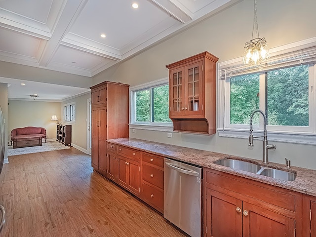 kitchen with light stone countertops, light hardwood / wood-style flooring, stainless steel dishwasher, and sink