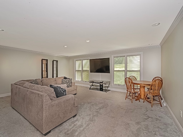 living room with crown molding and light colored carpet