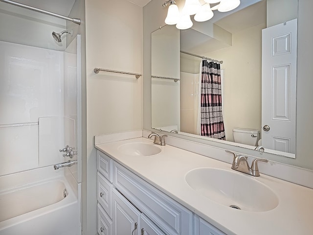 full bathroom with vanity, toilet, and shower / bath combo with shower curtain