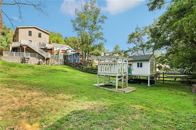 view of yard featuring a wooden deck