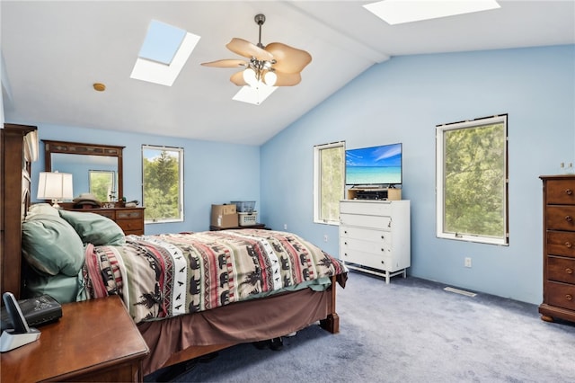 bedroom featuring lofted ceiling, light colored carpet, and ceiling fan