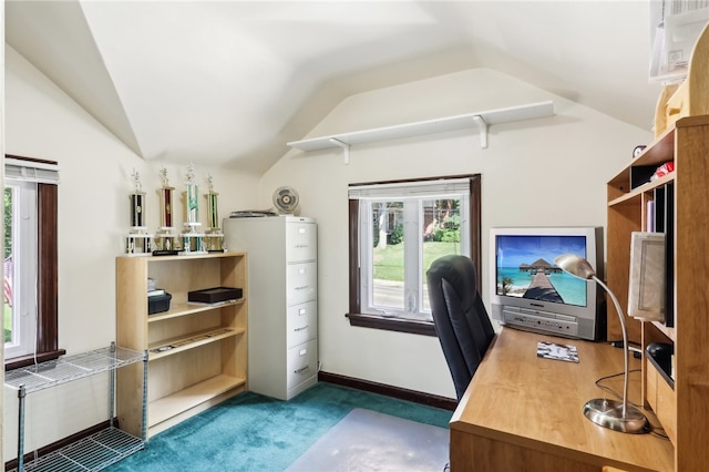 office area featuring lofted ceiling and dark colored carpet