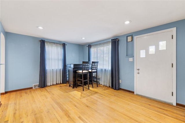 foyer entrance featuring light hardwood / wood-style flooring