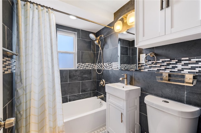 full bathroom with vanity, toilet, shower / bath combination with curtain, and tile walls