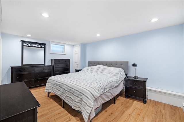 bedroom with light wood-type flooring