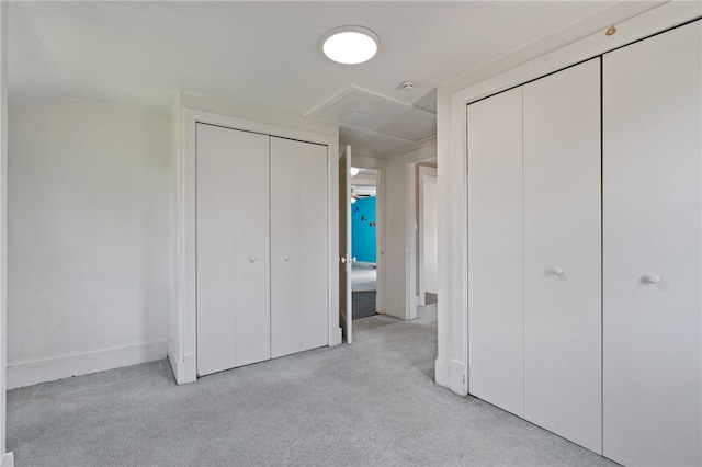 unfurnished bedroom featuring light colored carpet