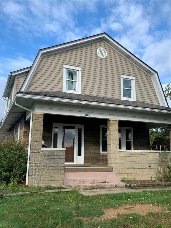 view of front facade featuring covered porch