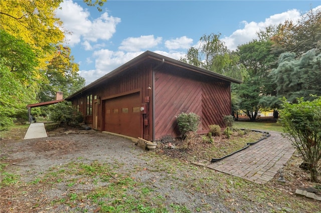 exterior space with a garage