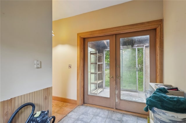 doorway to outside featuring a wealth of natural light and french doors