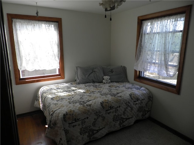 bedroom featuring dark hardwood / wood-style floors