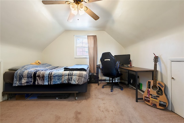 bedroom with carpet flooring, ceiling fan, and vaulted ceiling