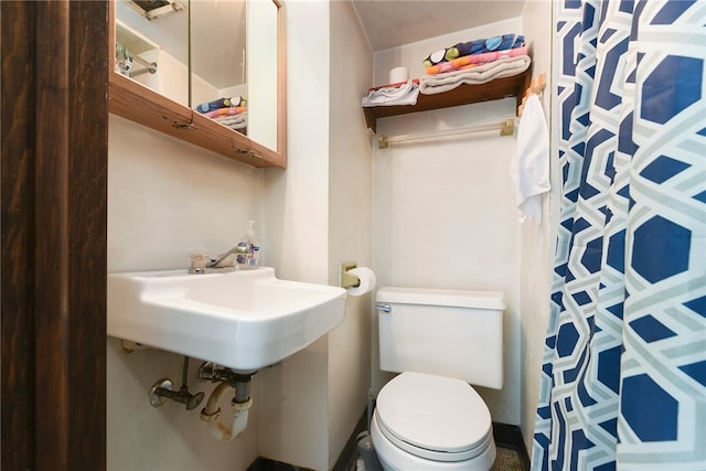 bathroom featuring toilet