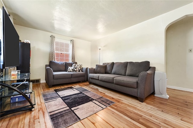 living room with light wood-type flooring