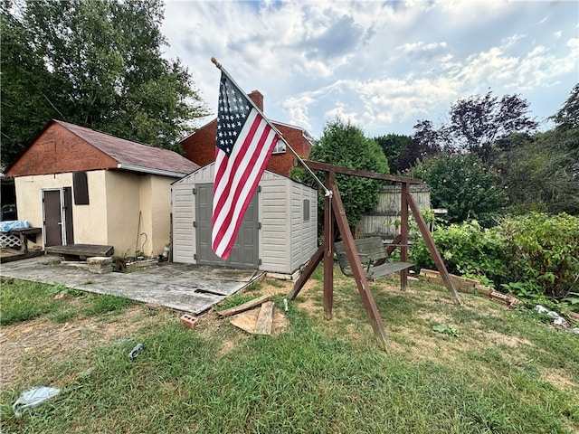 view of outdoor structure with a lawn