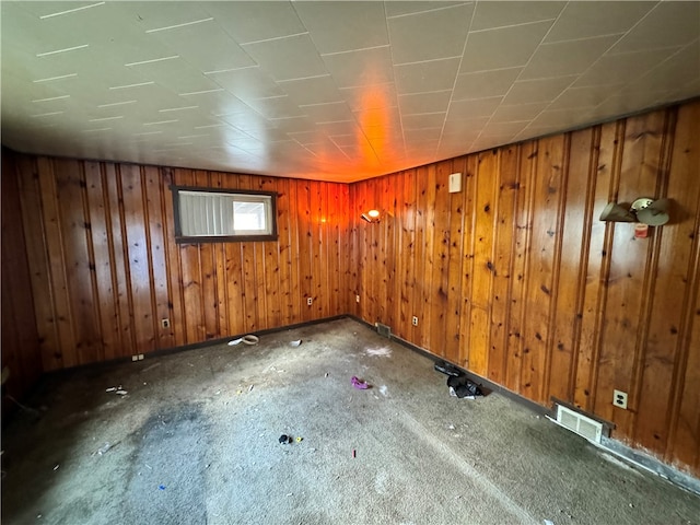 interior space featuring wood walls