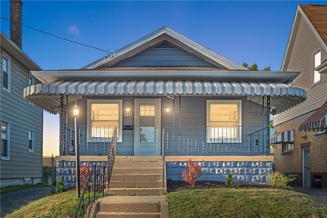 view of front of house featuring covered porch