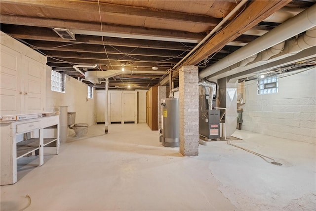 basement featuring gas water heater