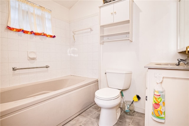 full bathroom with vanity, tiled shower / bath combo, toilet, and tile patterned floors