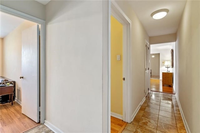 hallway featuring light wood-type flooring