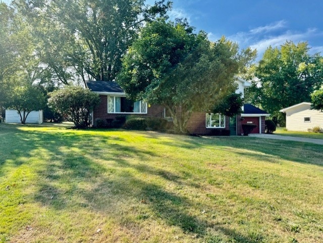 view of yard with a garage