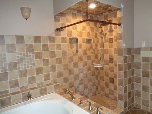 bathroom with tiled shower