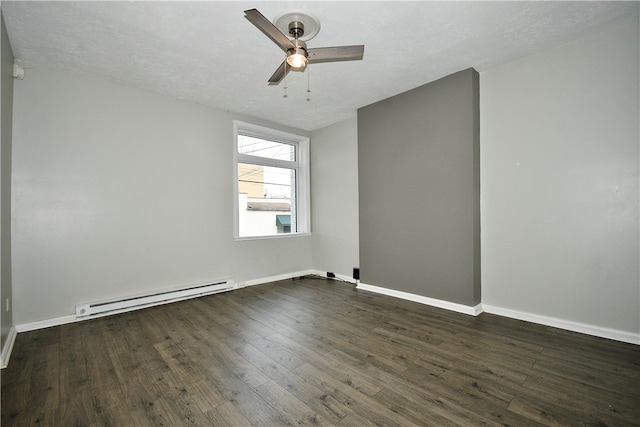 unfurnished room with a baseboard heating unit, dark wood-type flooring, and ceiling fan