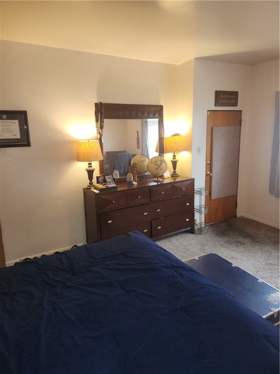 bedroom with light colored carpet