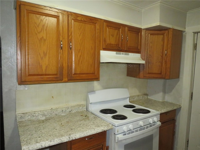 kitchen featuring light stone counters, backsplash, ornamental molding, and white range with electric stovetop